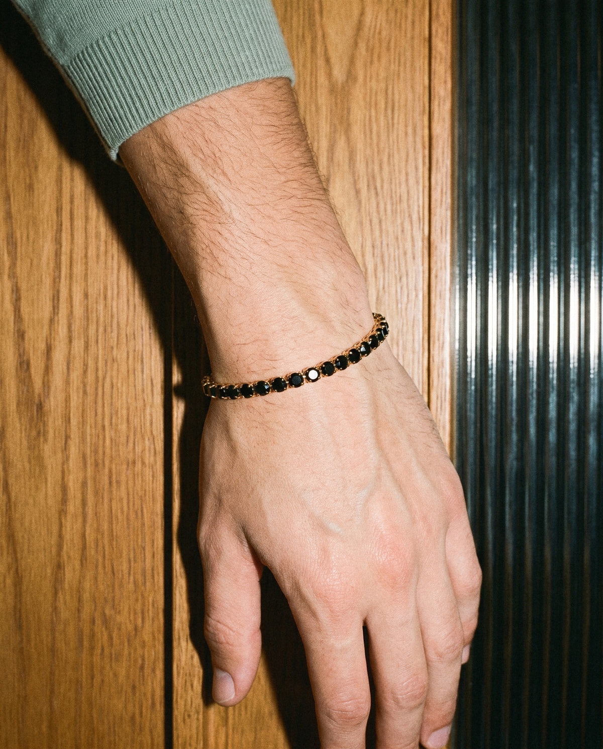 Tennis Black Bracelet (Gold), worn