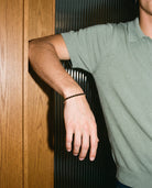 Tennis Black Bracelet (Gold), worn