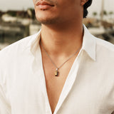 Horizon tiger's eye pendant on model, harbour